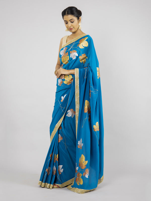 Hand-Painted Turquoise Pure Crepe Silk Saree