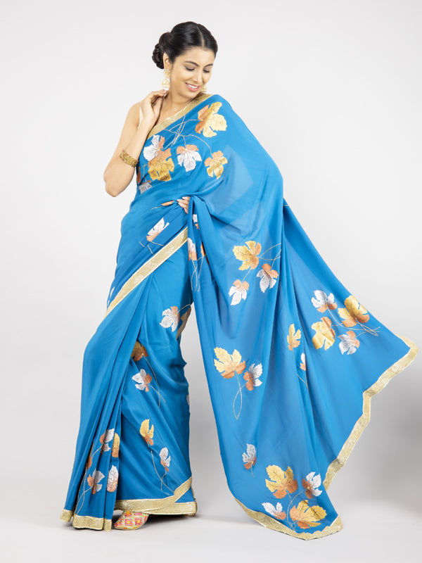 Hand-Painted Turquoise Pure Crepe Silk Saree